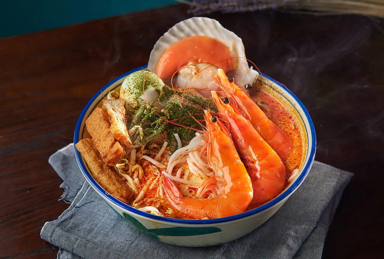 Scallops, prawns, tau pok, on top of laksa gravy